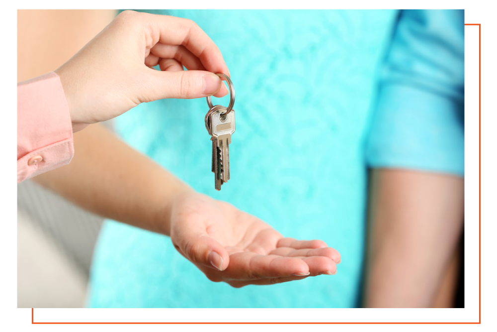 handing keys to tenant