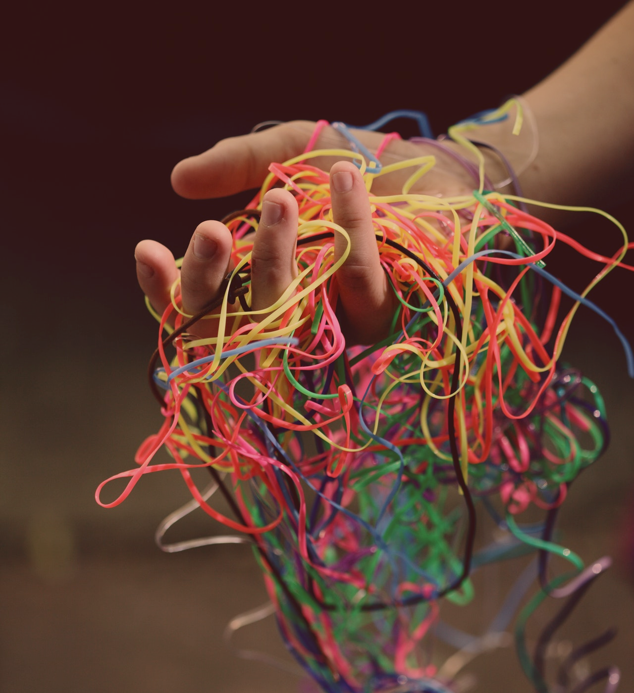 hand holding tangled string